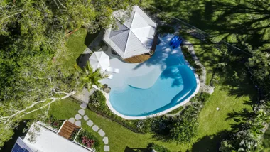 aerial shot of cairns luxe stay pool