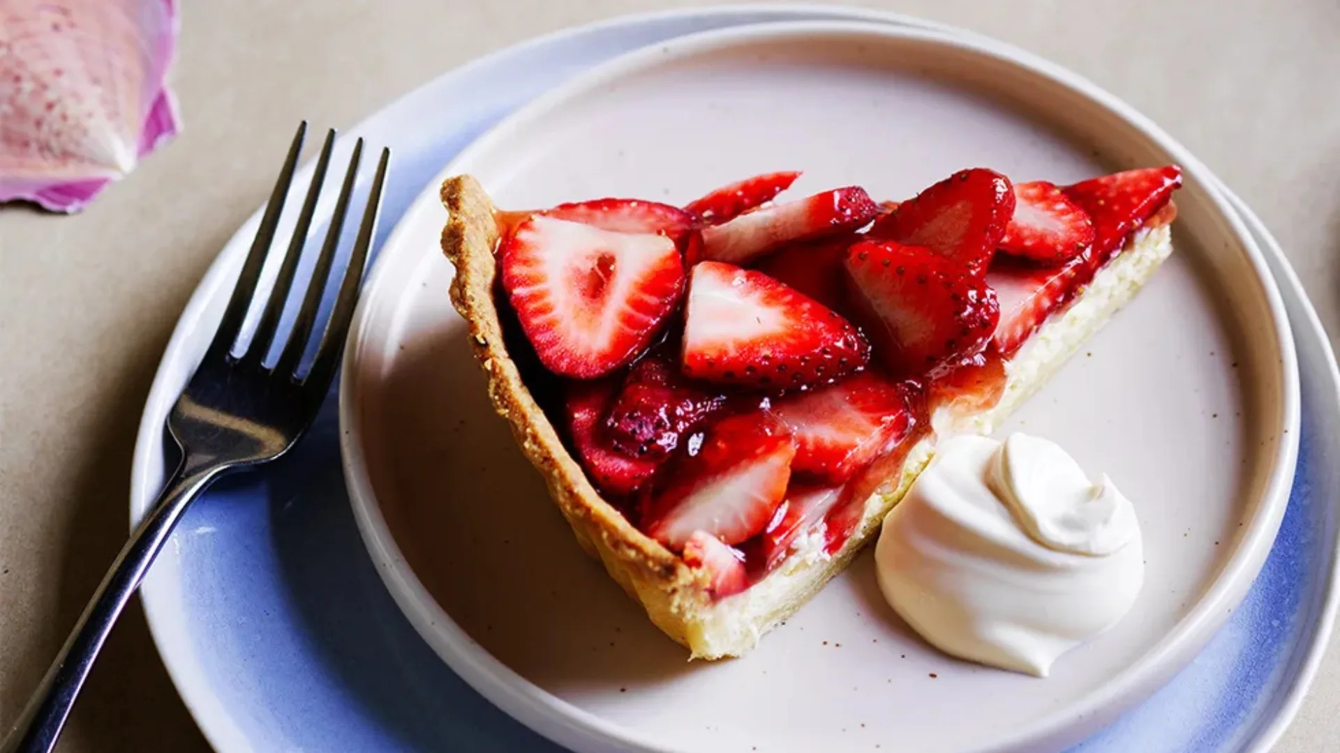 A picture of Sean Moran's cheesecake with strawberries on top