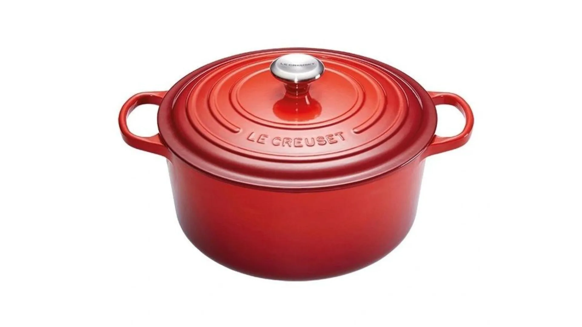 One of Le Creuset's signature Dutch ovens in red.