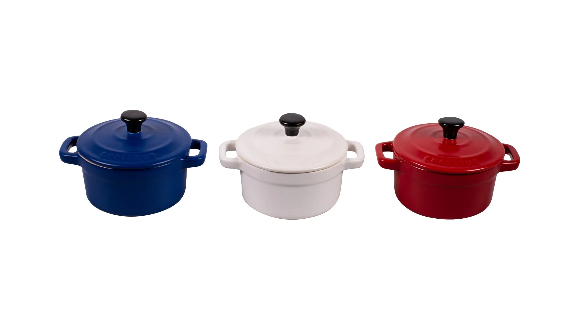 Chasseur cocette Dutch ovens in blue, white and red.