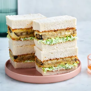 Japanese recipe for stacked eggplant katsu sandos recipe on pink plate