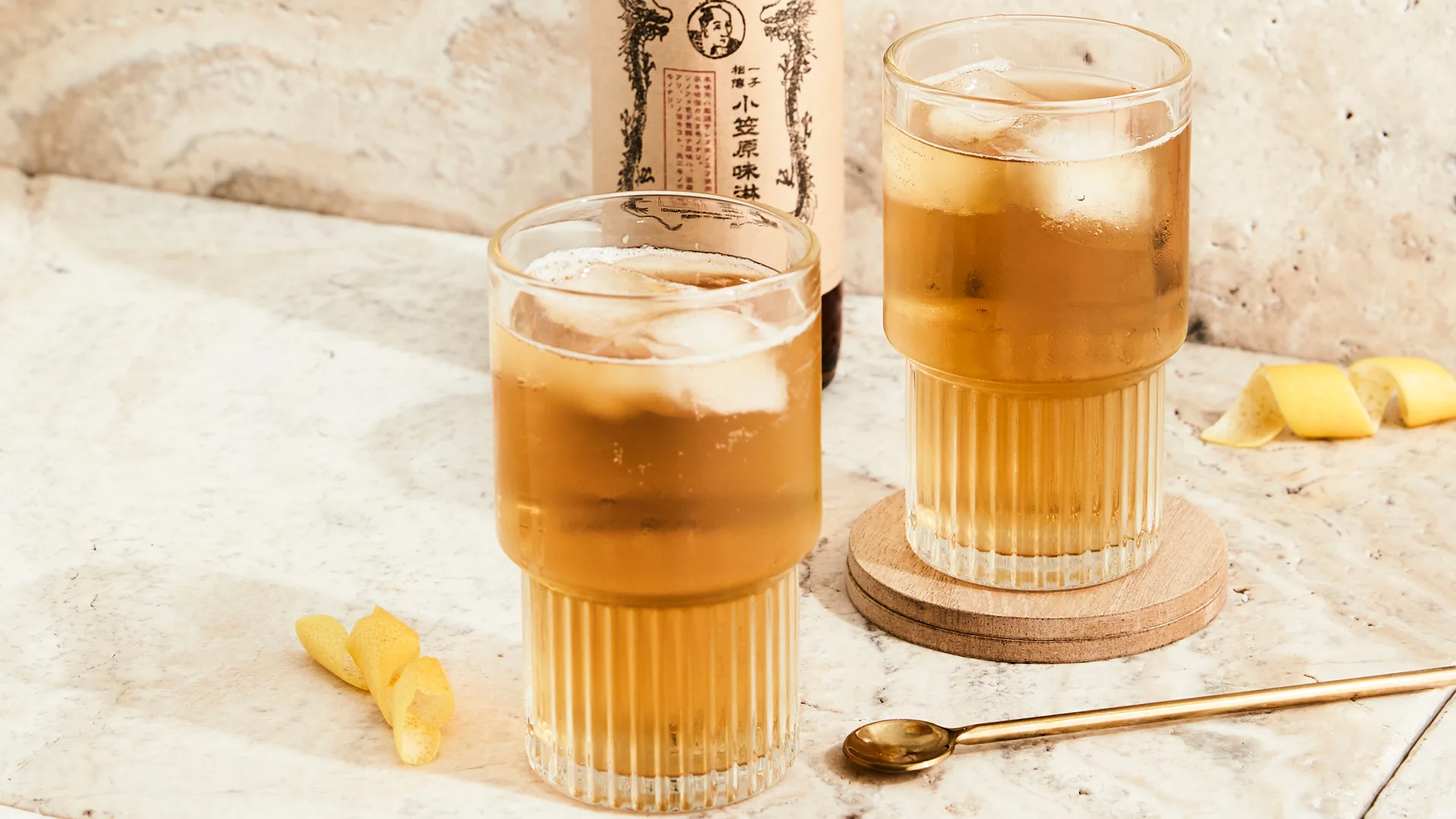 Whisky Highball cocktail in two stemless glasses