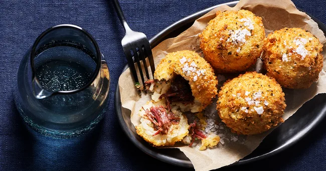 Four braised beef arancini.