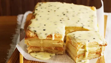 Vanilla slice recipe with passionfruit icing with square cut to show cross section