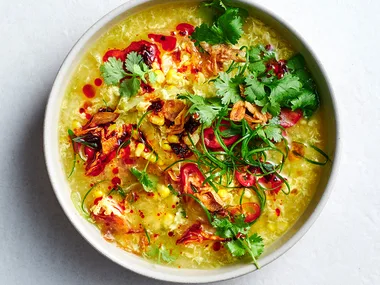 Chinese egg drop soup in white bowl.