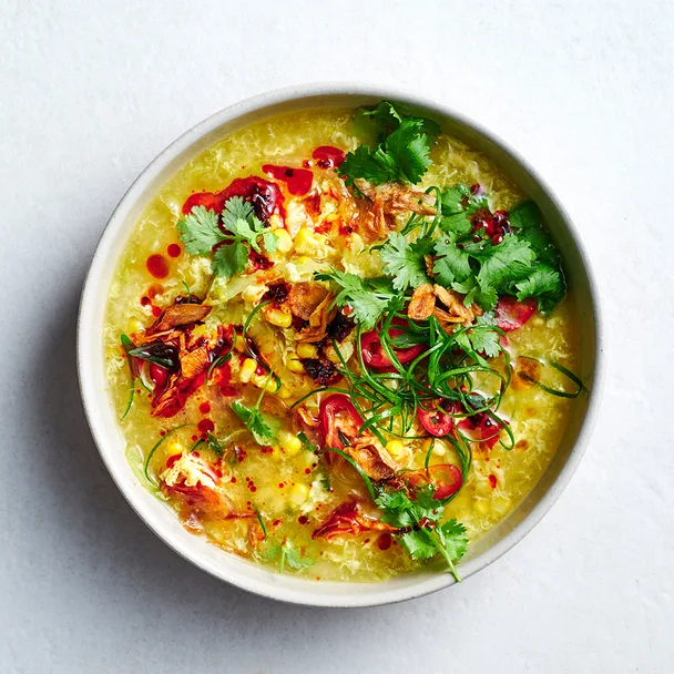 Chinese egg drop soup in white bowl.