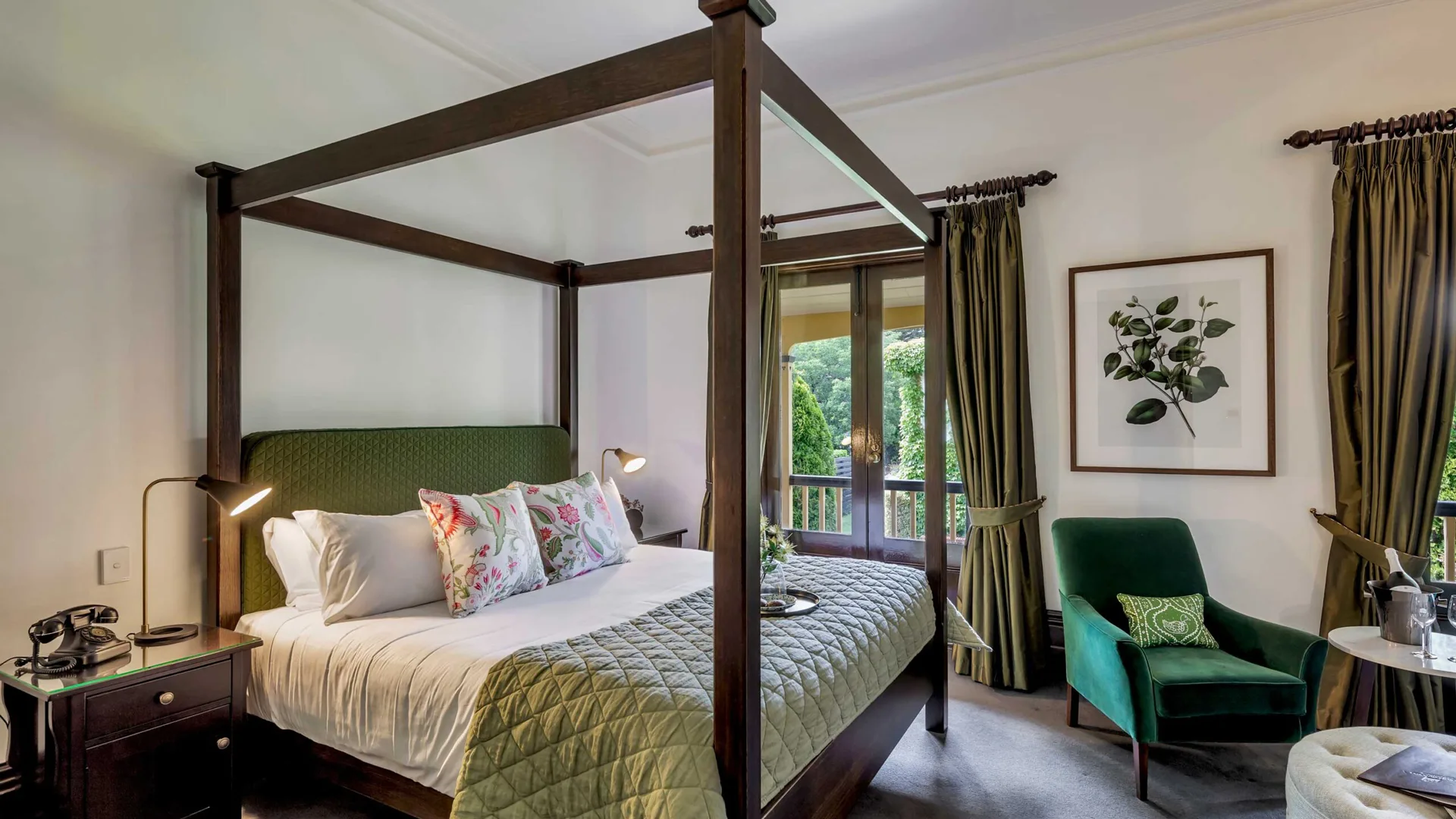 Stately bedroom with green accents and poster bed at Luxury Adelaide Hills Mount Lofty House