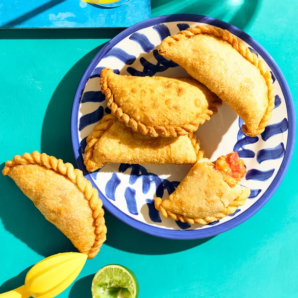 Prawn and tomato empanadas with picante sauce.