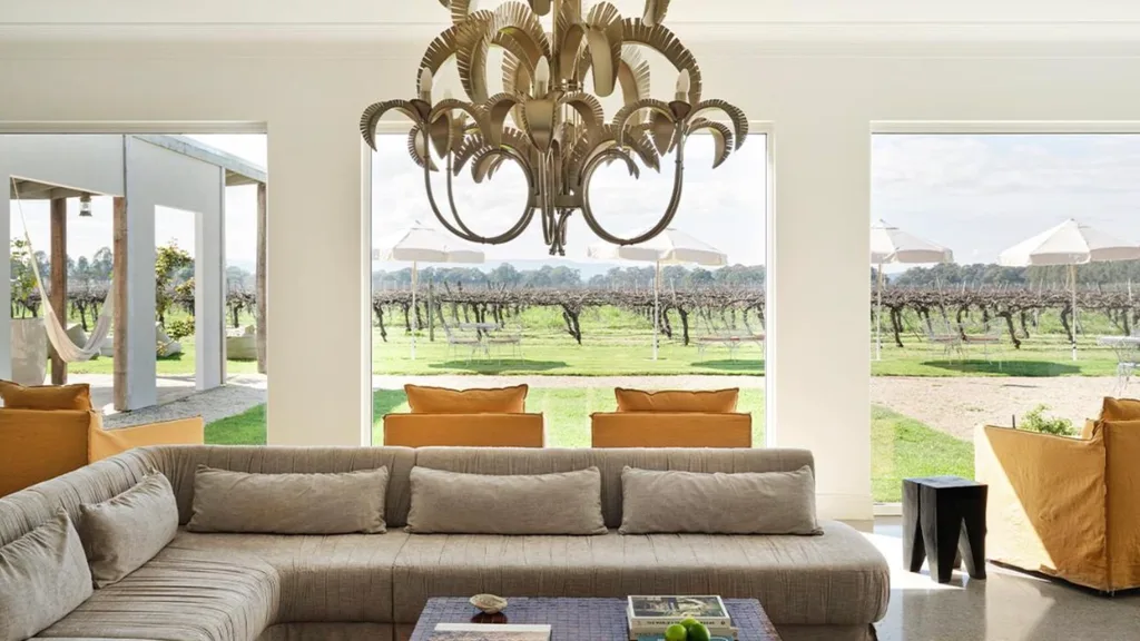 A lounge area overlooking vineyards at the Lancemore Milawa in Victoria's High Country.