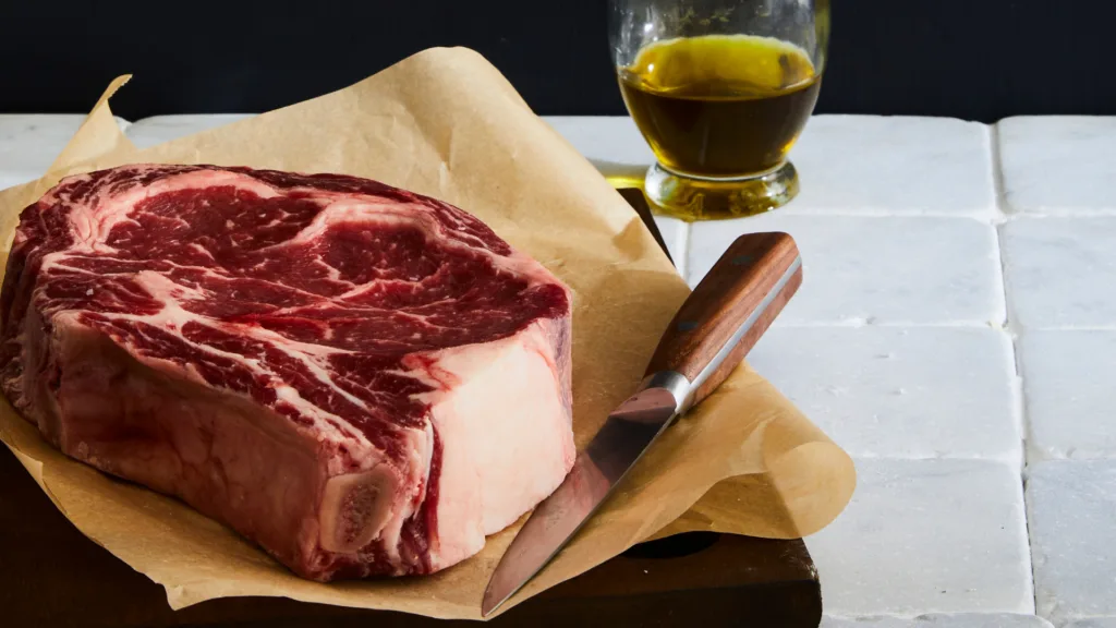 Types of steaks: a ribeye steak on the bone.