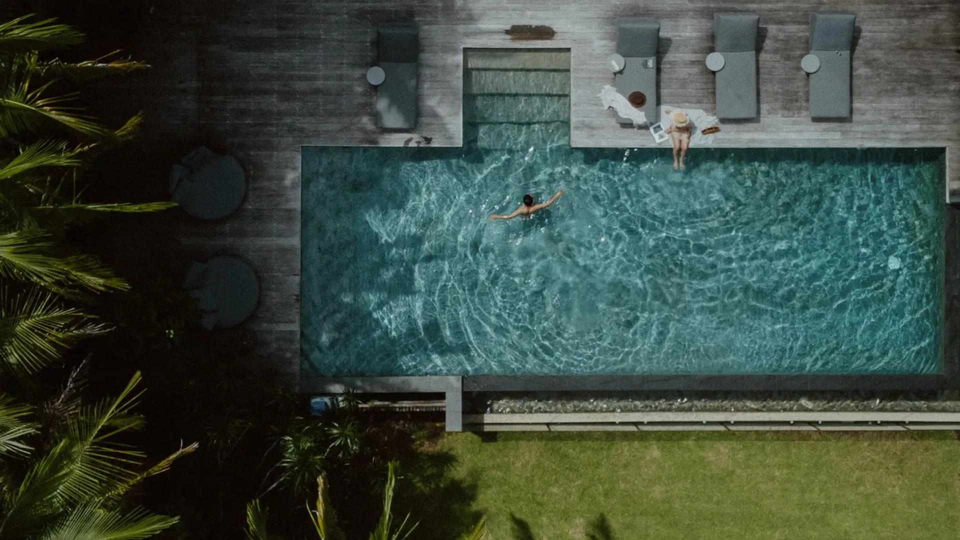 ariel shot of people in an infinity pool in clunes