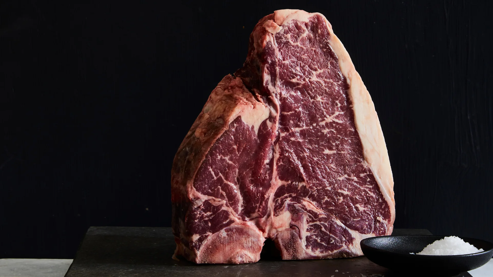 Types of steak: a T-bone cut of steak.
