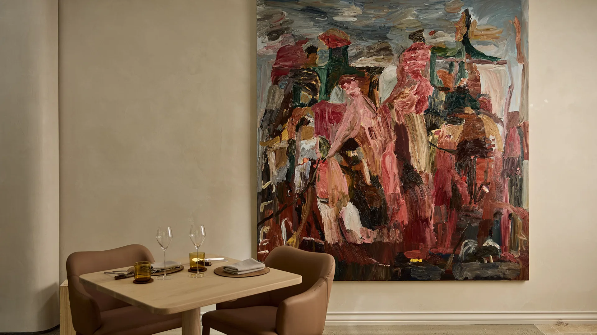 Best new restaurant finalist LVN Restaurant in Adelaide Hills - dining table with striking painting behind