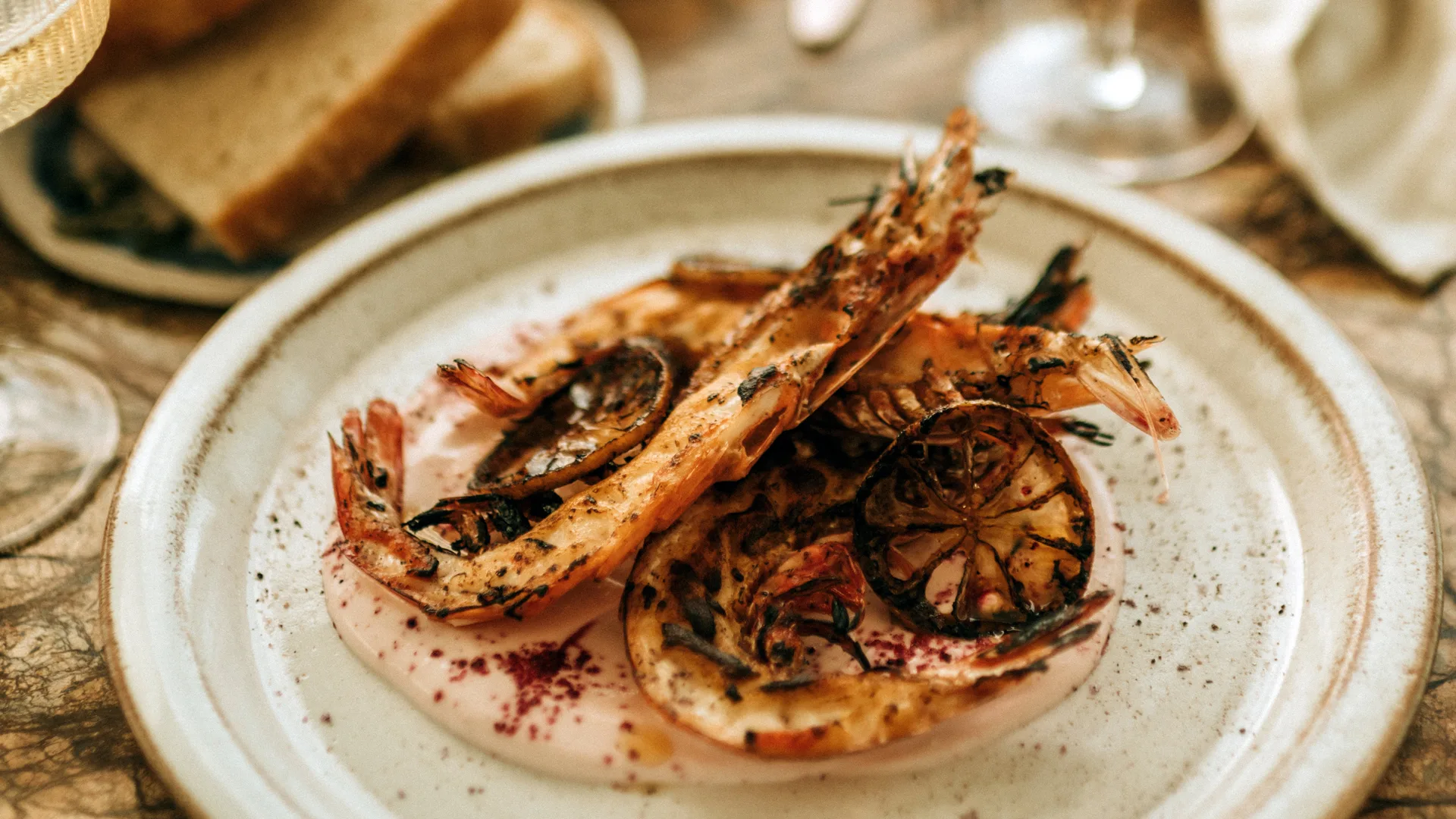 Maria restaurant in Hobart - prawn dish with citrus on white plate