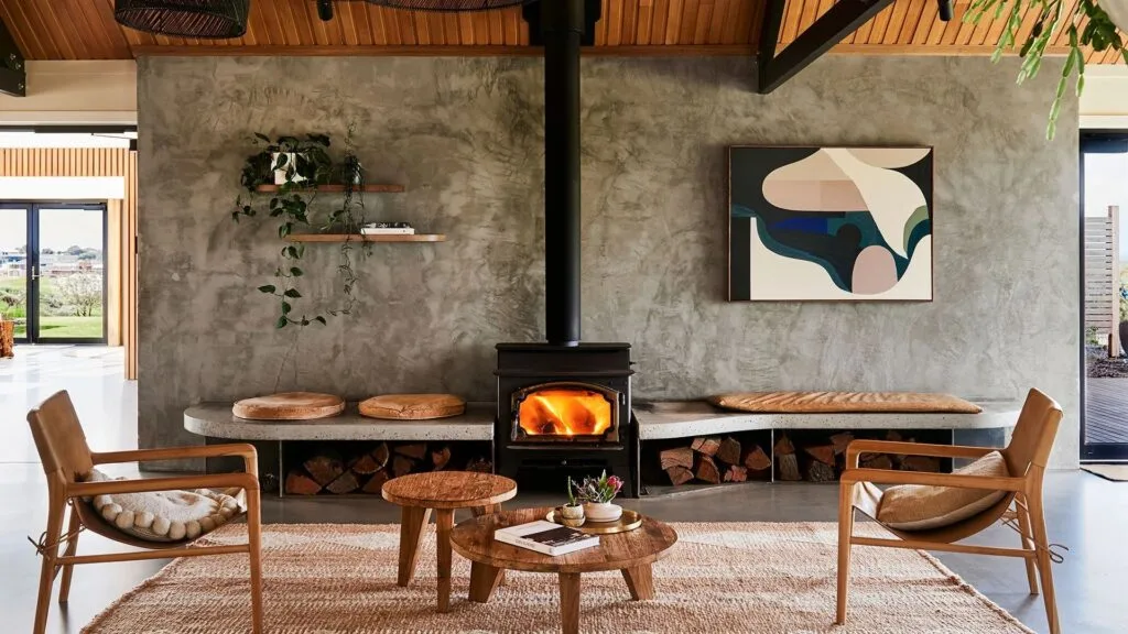 contemporary dining room by a fireplace