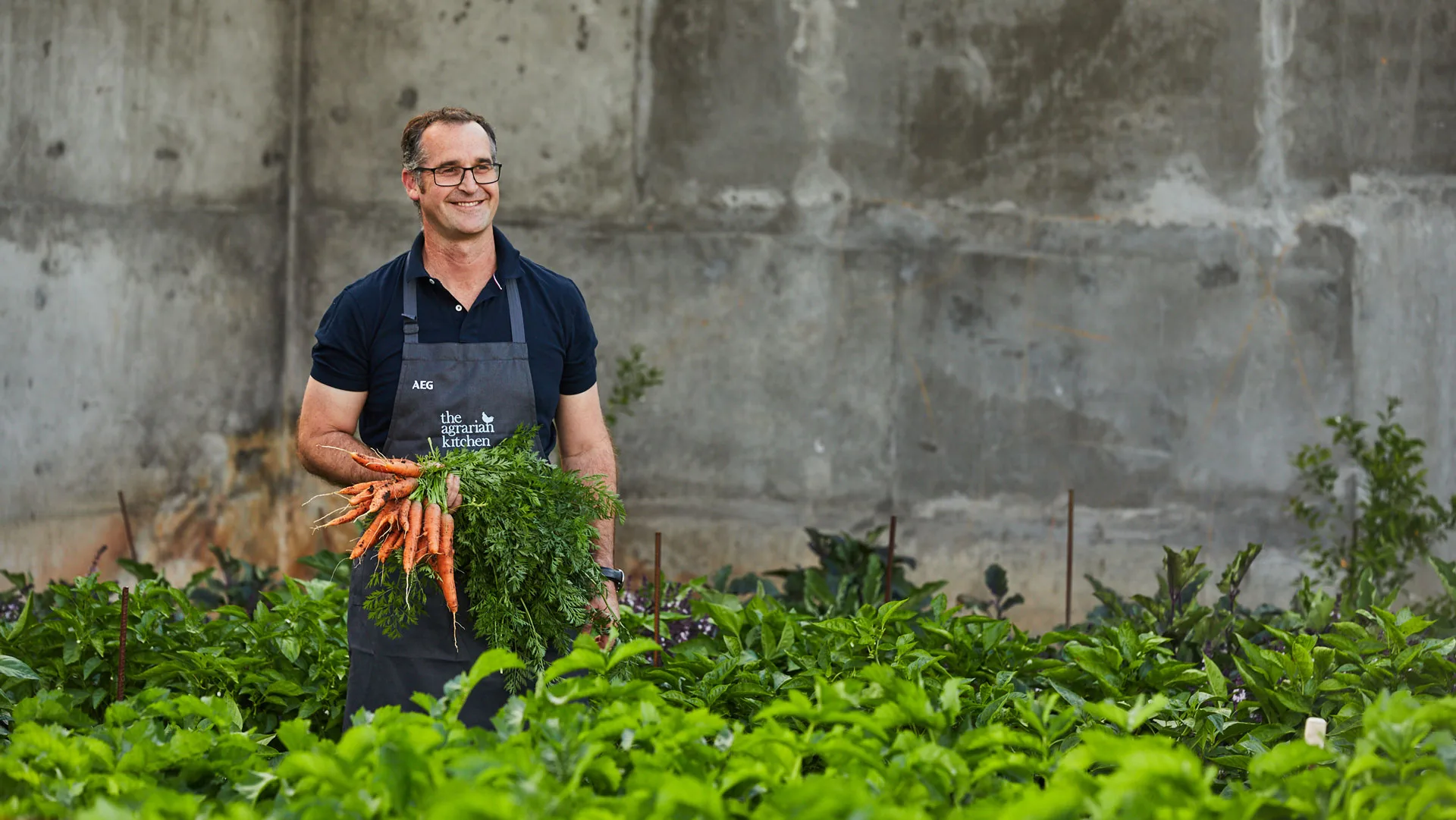 Portrait of chef Rodney Gunn in the kitchen garden of The Agrarian Kitchen Restaurant in New Norfolk, Tasmania