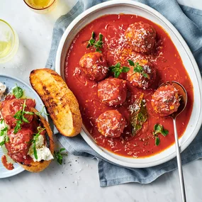 Pork and fennel polpette with a side of toasted bread.