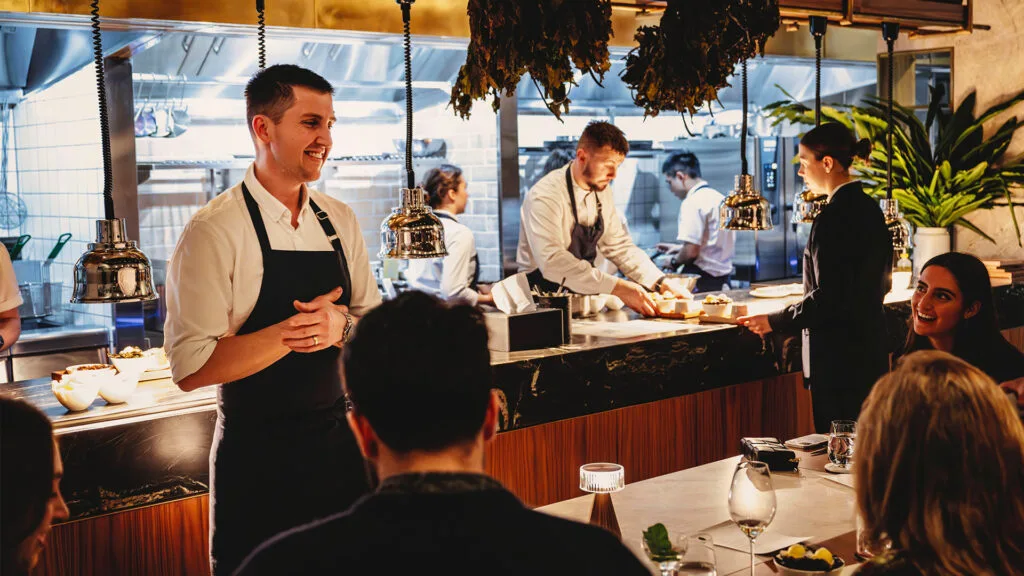 Chef-owner Josh Niland greeting guests at the new iteration of Saint Peter in the Grand National Hotel, Paddington.