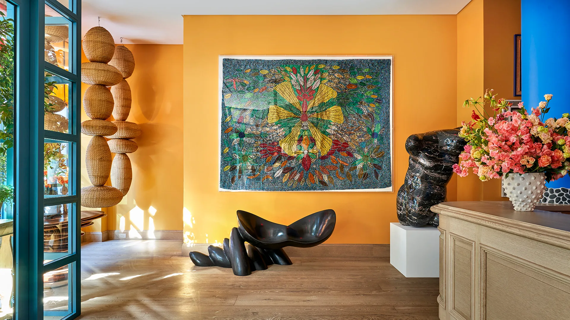 The buttercup yellow lobby at Warren Street Hotel designed by Kit Kemp