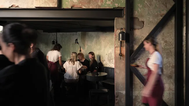 A candid photo of Agnes in Fortitude Valley, Brisbane. The picture shows diners and waitresses moving about.