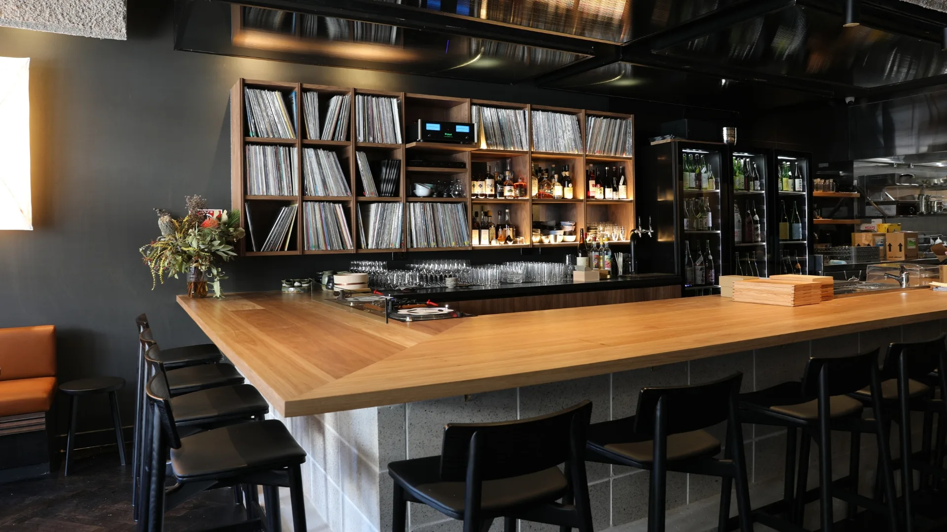 The bar at Ante in Sydney's Newtown, surrounded by records and sake.