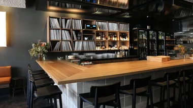 The bar at Ante in Sydney's Newtown, surrounded by records and sake.