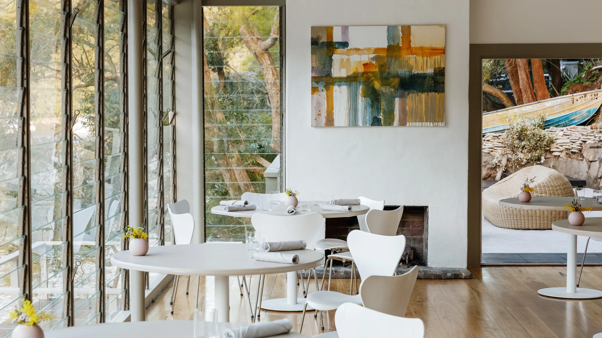 Clean and bright interiors overlooking the water at Berowra Waters Inn