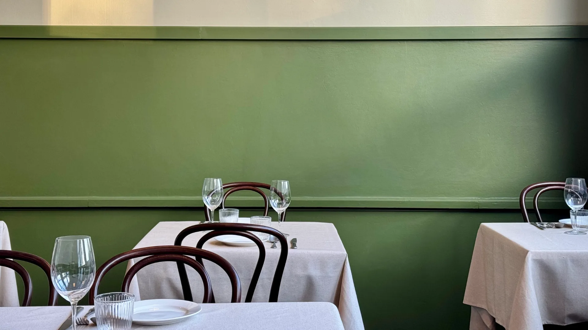 The green-walled dining room at Best Destination Dining Award-winner Staguni.