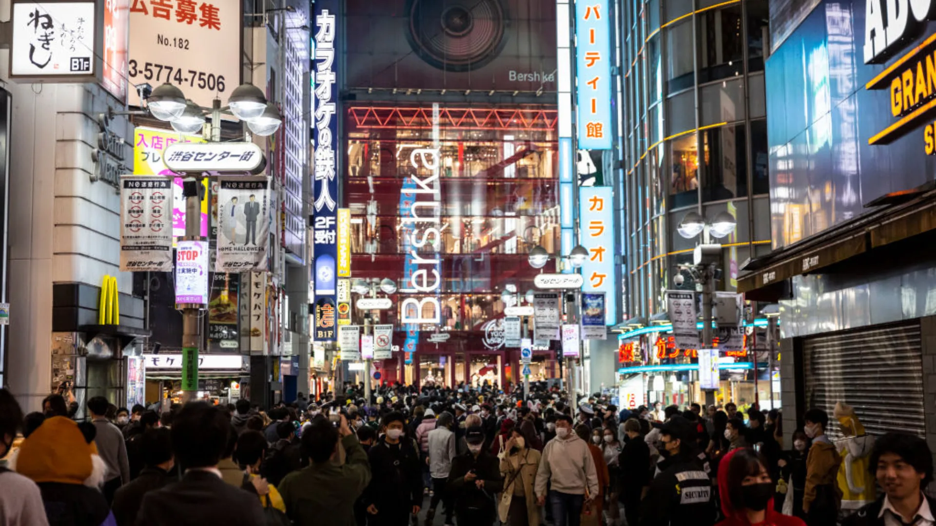 A crowd of people in Tokyo's busy Shibuya district.