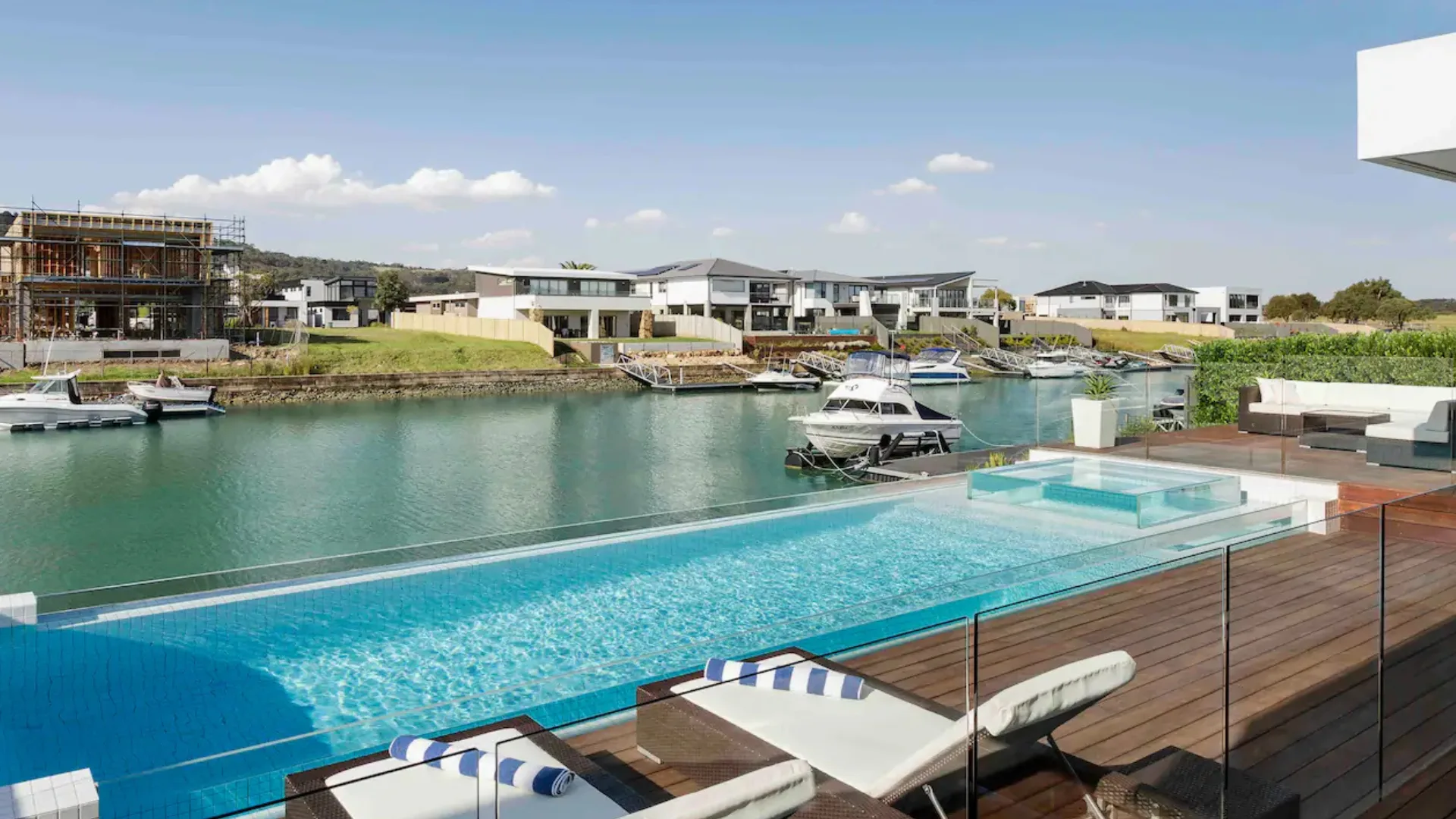 The pool and deck looking onto the marina at Crown Cove Luxury Mornington Peninsula