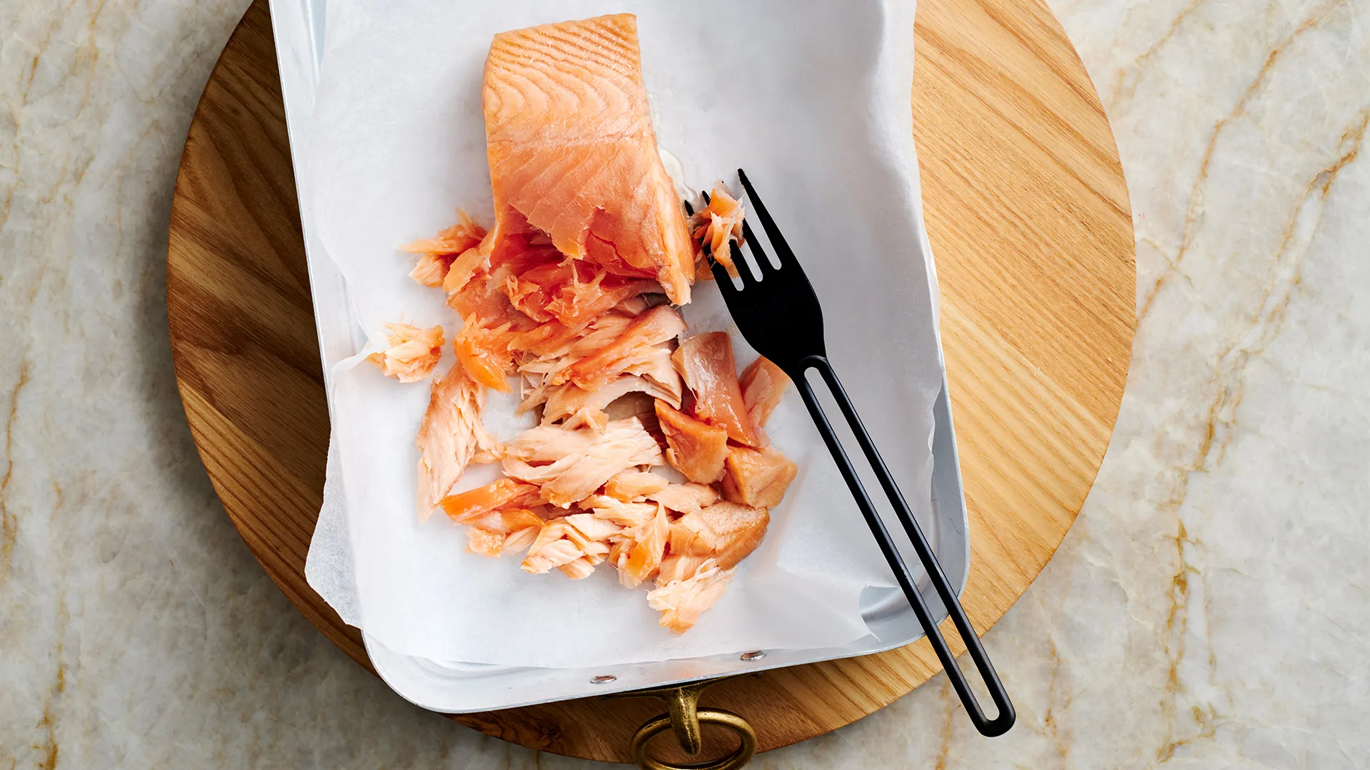 Flaking the salmon.