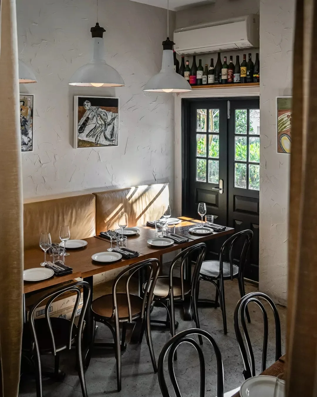 A sunken, light-filled private dining room in the heart of Potts Point