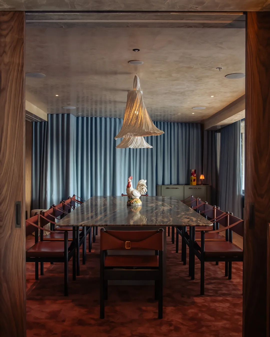 Flaminia's private dining room, La Stanza, with Pilu's chicken statue standing guard 