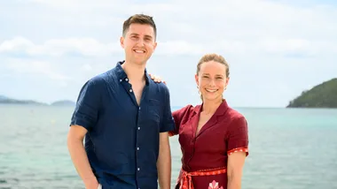 Josh and Julie Niland with Catseye Beach on Hamilton Island in the background, at the build site of their new restaurant at The Sundays Hotel