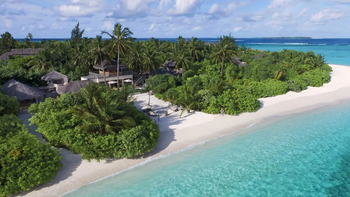 An aerial view of Six Senses Laamu, one of the best Maldives resorts for surfing.