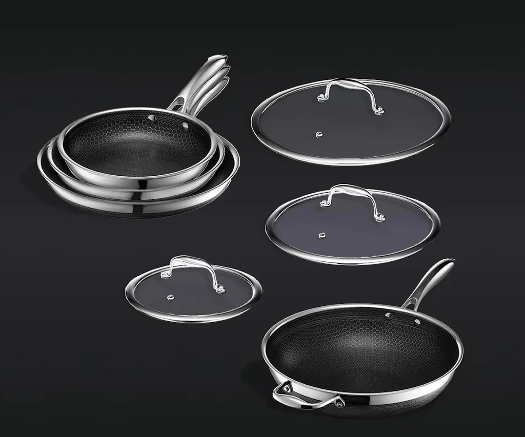 The HexClad stainless steel 7 piece cookware set with wok and lids.
