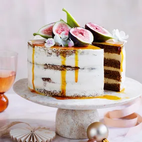 Date, gingerbread and yoghurt naked layer cake with burnt orange caramel