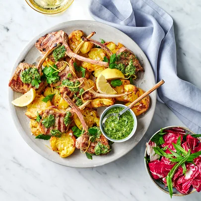 Lamb scottadito with mint salsa verde and roast crushed potatoes