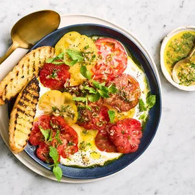 Marinated heirloom tomato and stracciatella