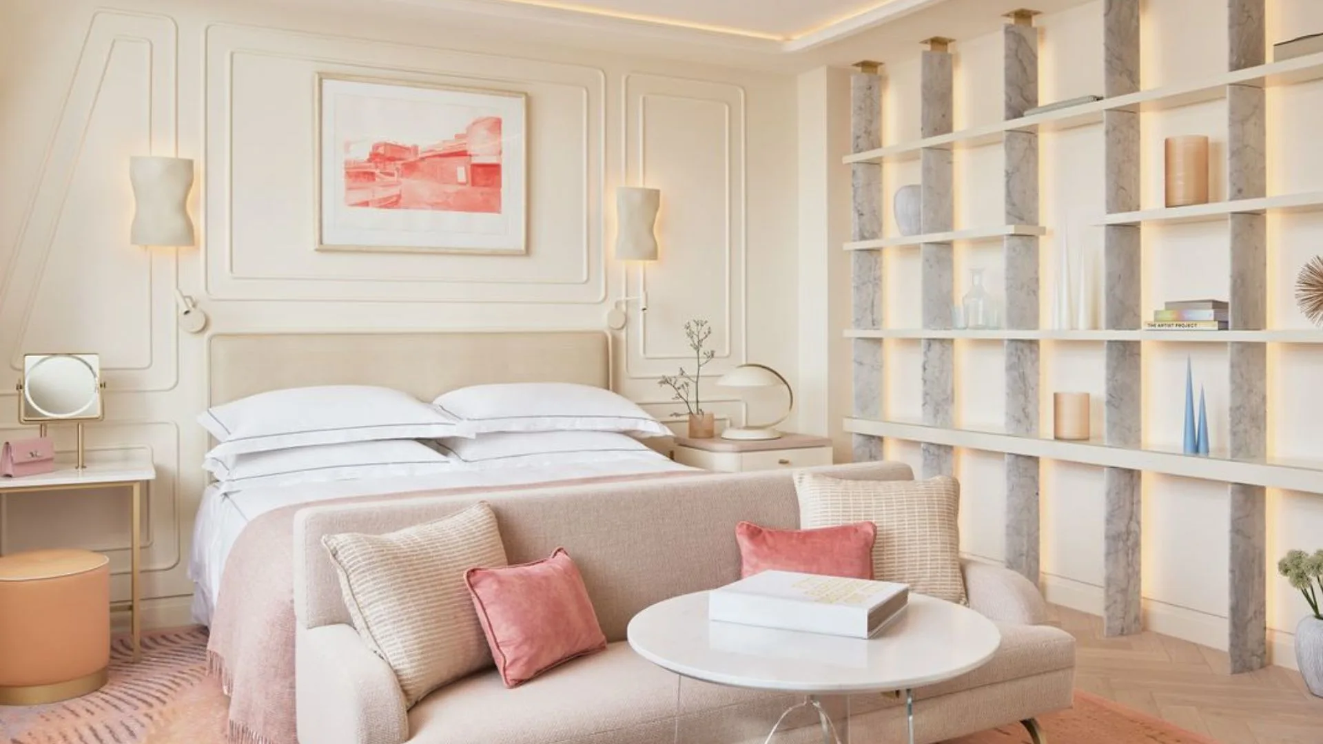 Elegant interiors with a pop of colour in a deluxe room at One Aldwych