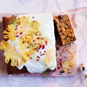 Spiced pineapple Christmas cake with rum-lime icing