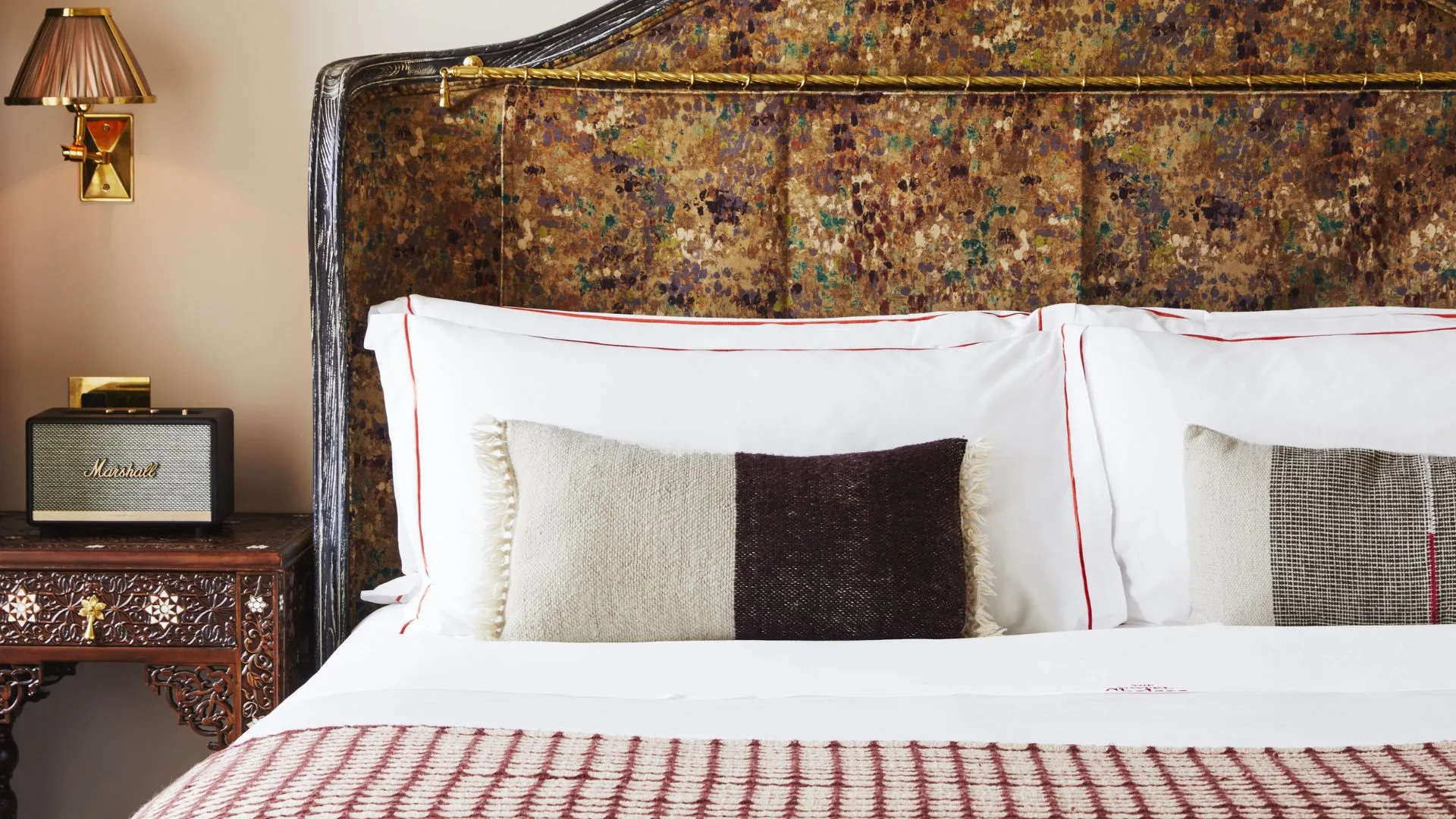 Bed in guest room at iconic New York hotel, The Chelsea