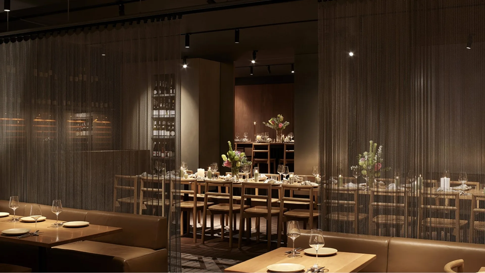 Open spaces, timber chairs and minimalist decor at ARU melbourne