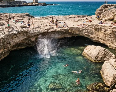 people jumping into puglia ocean and swimming