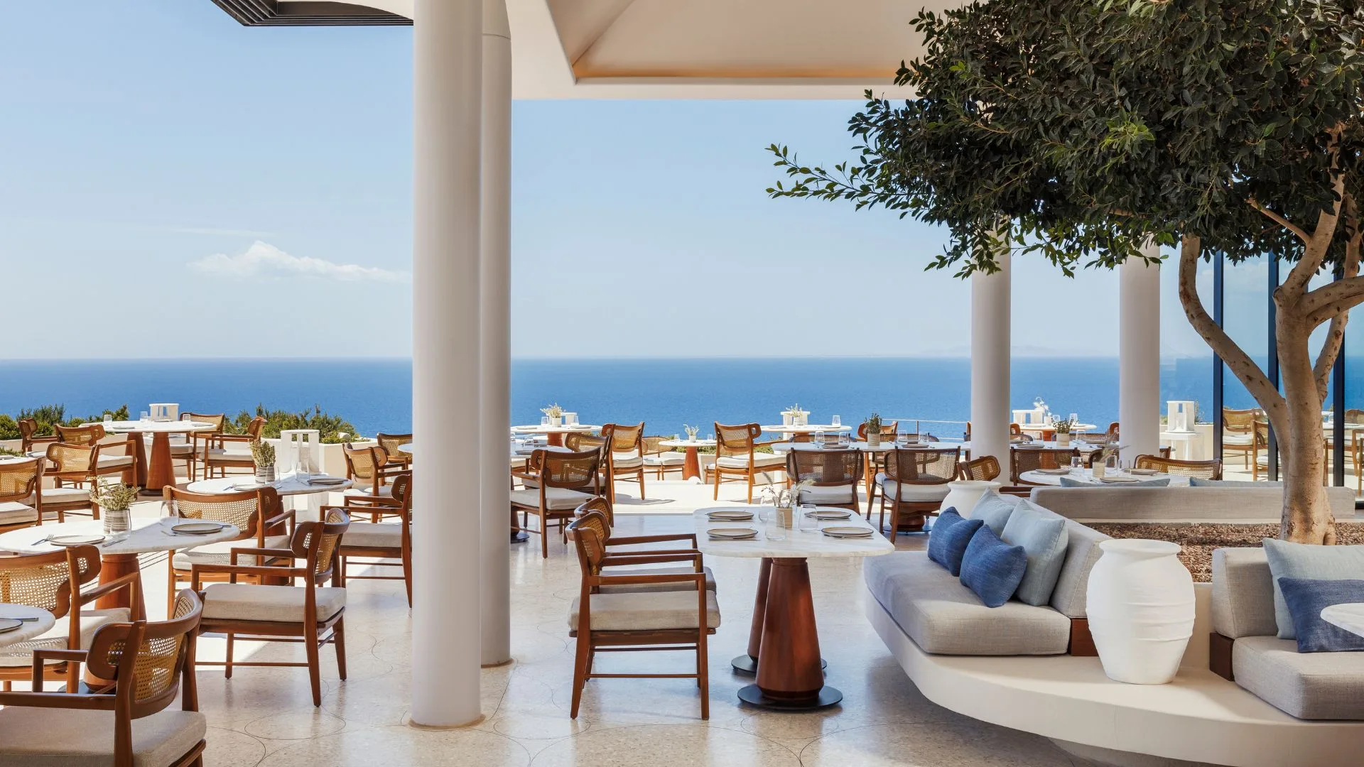 Outdoor dining at one of the best Greece luxury resorts, One&Only Kéa Island.