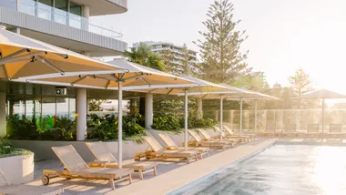 Kirra Point hotel exterior and pool.