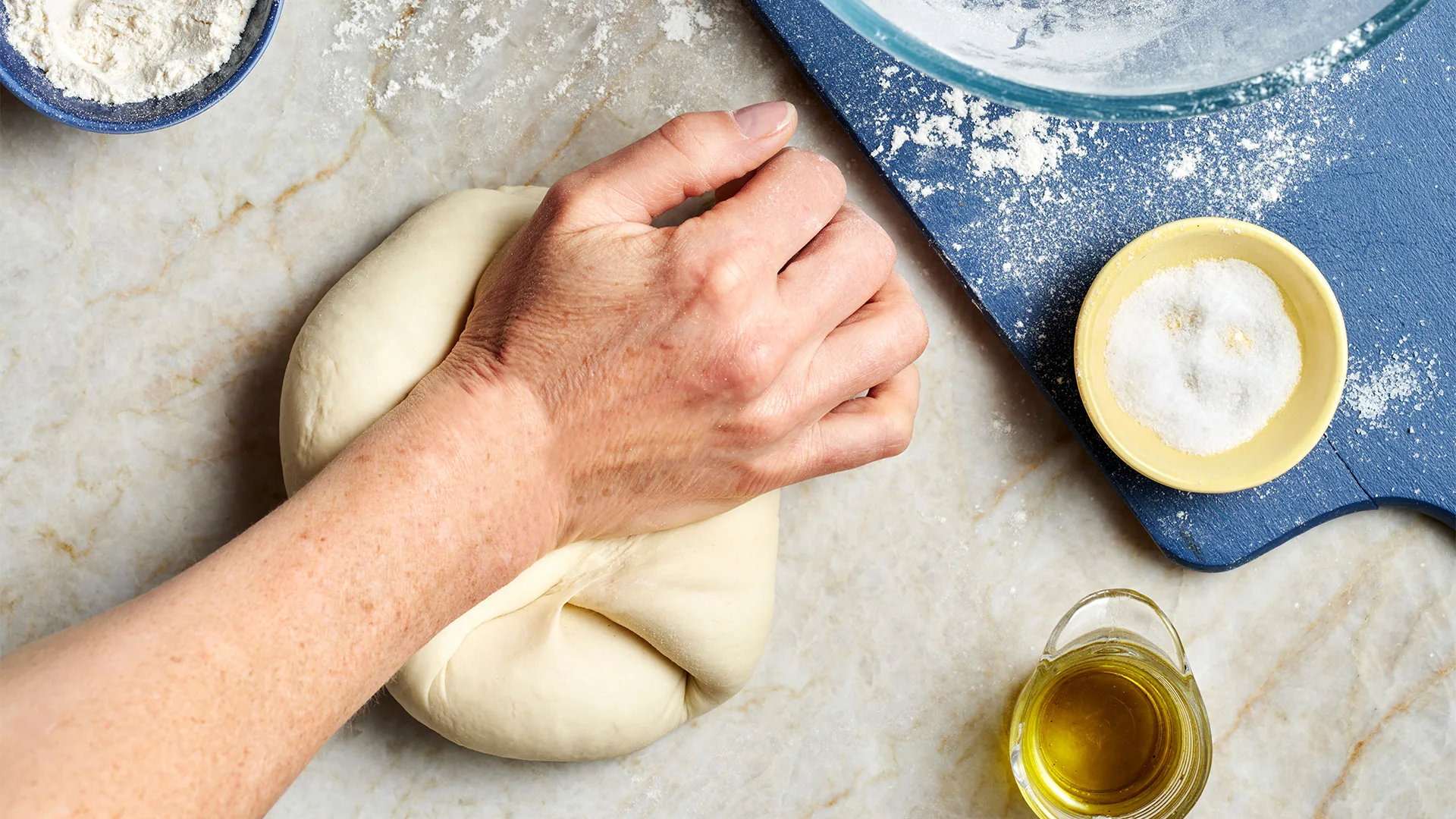 Rolling out fillo dough.