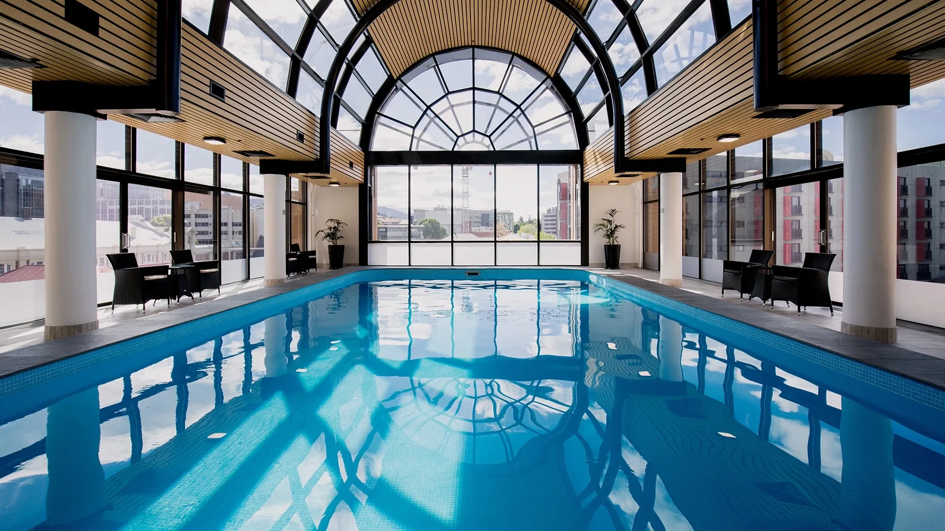 The indoor heated pool has scenic views at the Hotel Grand Chancellor, Hobart.