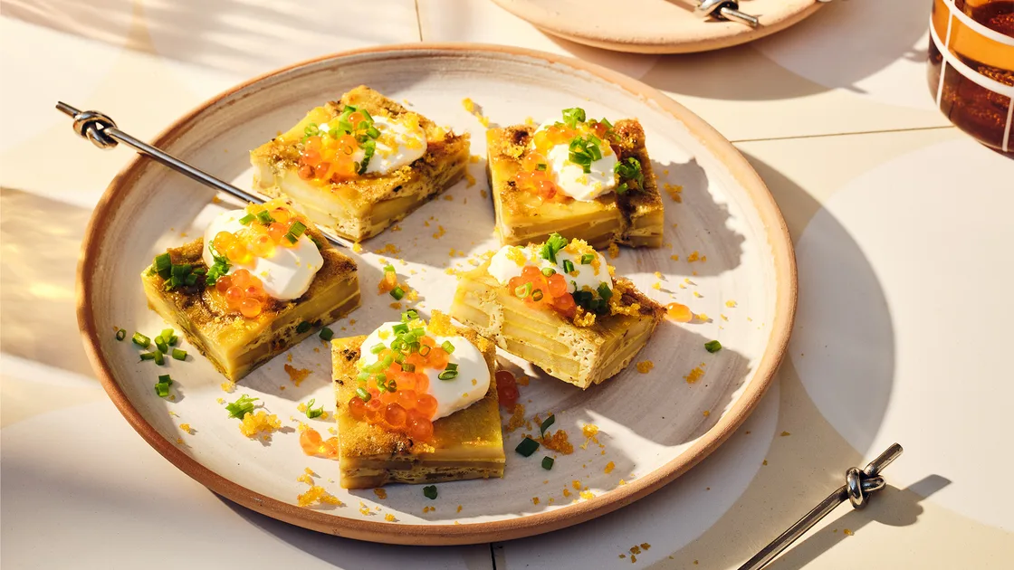 Potato and thyme tortilla with crème fraîche, salmon roe and bottarga recipe - Gourmet Traveller