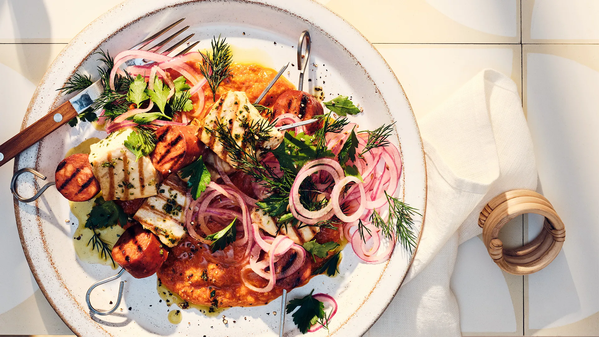 Swordfish and chorizo skewers with macadamia romesco